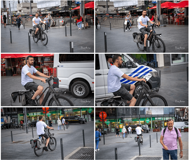  A man rides a bicycle through a city square, passing shops, pedestrians, and a police van; the final frame shows him walking his bike.